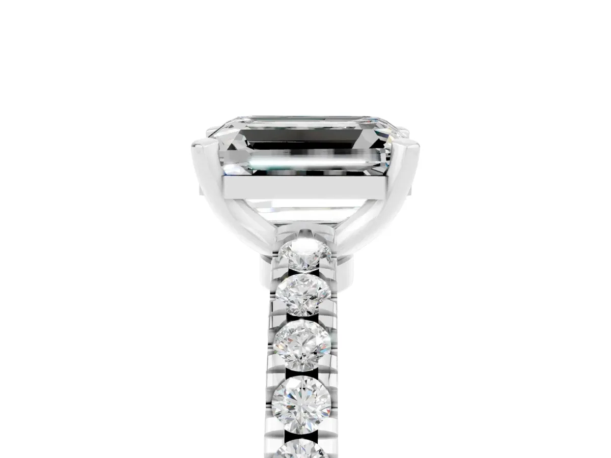 Emerald Cut Solitaire Moissanite with Pavé Band and Four-Prong Setting Silver