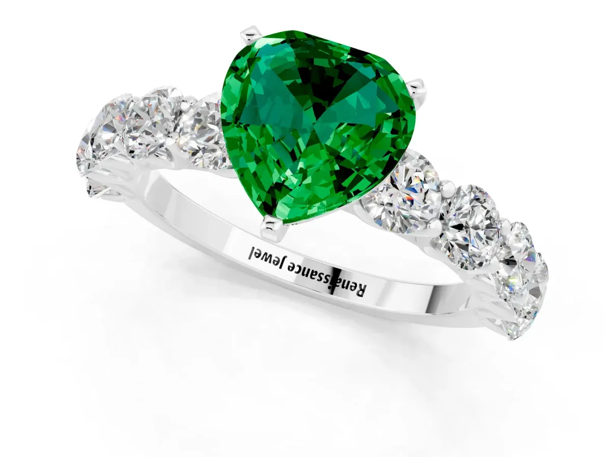 Heart Cut Emerald Prong Setting with Side Stones on a Pave Band Silver
