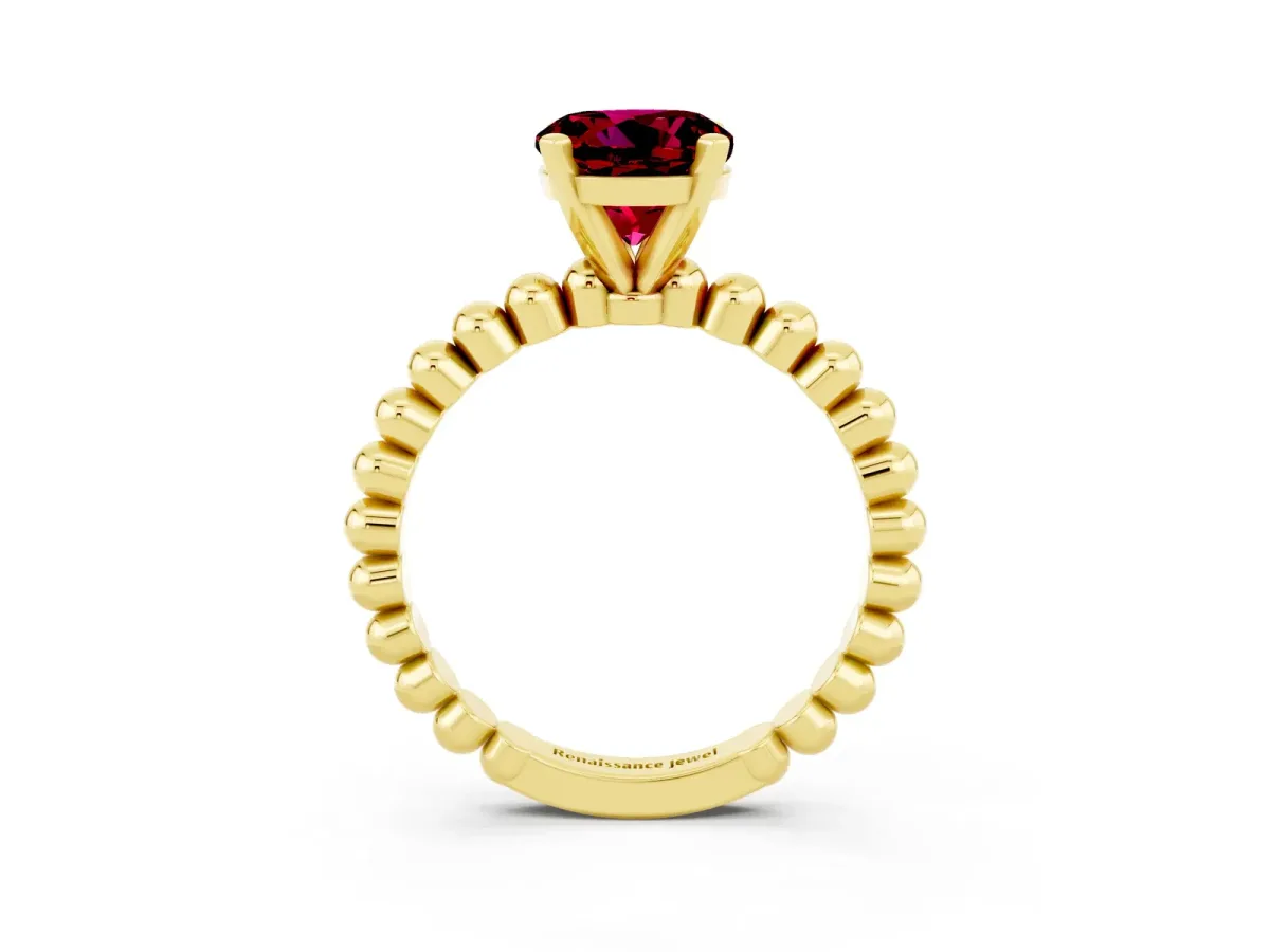 Round Cut Garnet Solitaire Ring with Beaded Band and Prong Setting Yellow gold
