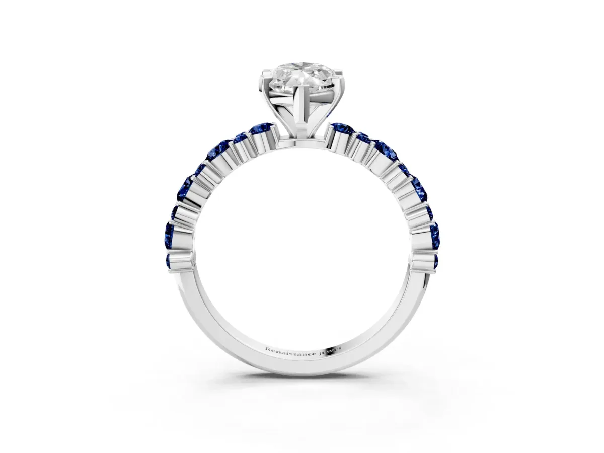 Marquise Cut Diamond Side Stone Solitaire Ring with Round Blue Sapphire and Four-Prong Setting Platinum