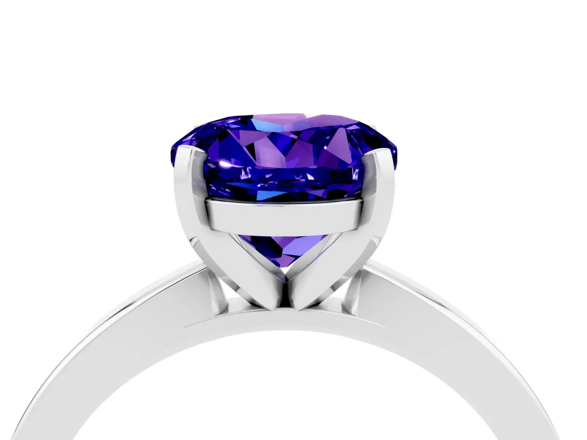 Round Cut Tanzanite Solitaire Engagement Ring with Classic Band and Four-Prong Setting Silver