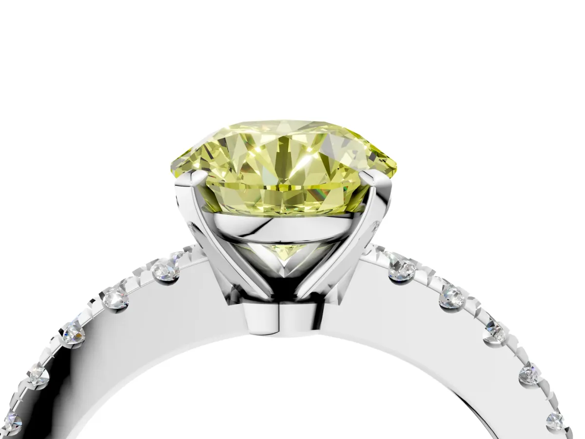 Fancy Yellow Round Cut Solitaire Diamond with Pavé Band and Four-Prong Setting Silver
