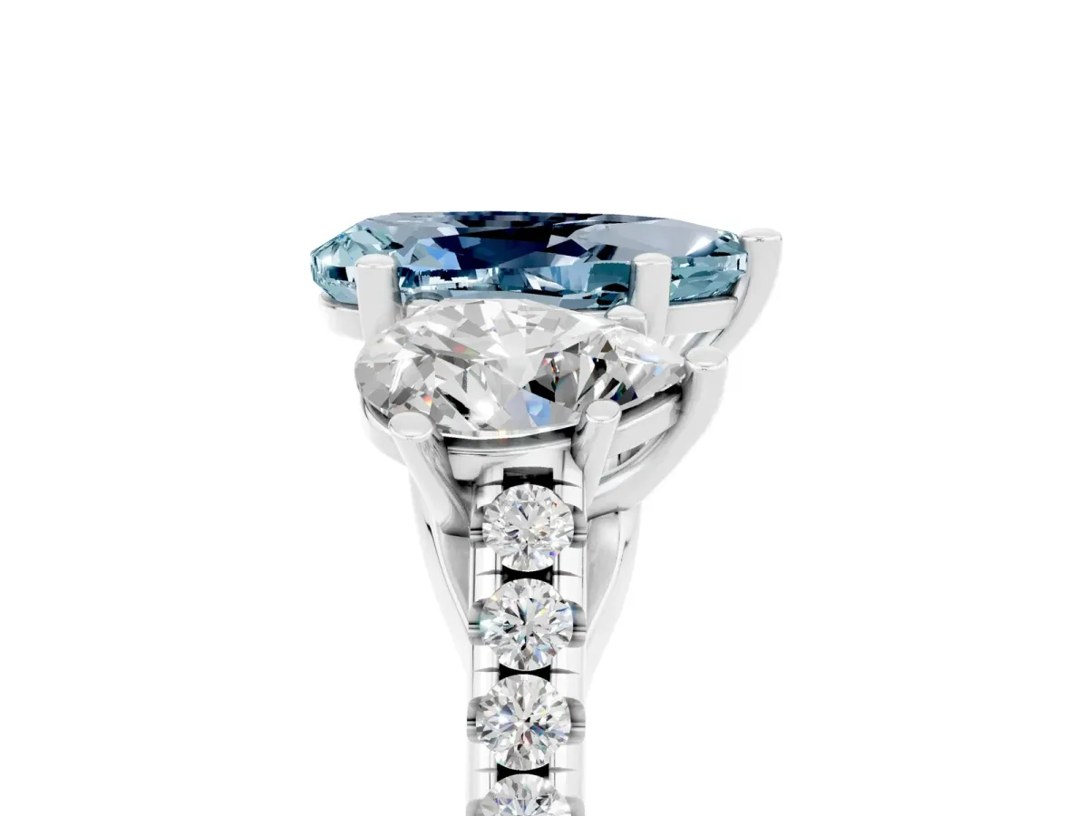 Three-Stone Pear Cut Aquamarine Ring with Round Pavé Band and Prong Setting Silver
