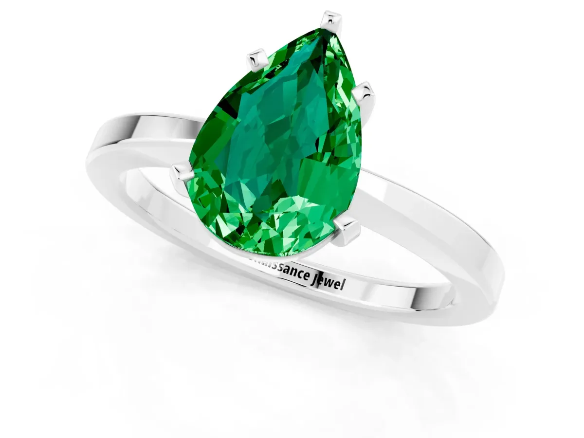 Pear Cut Emerald Solitaire Engagement Ring with Classic Band and Four-Prong Setting Silver