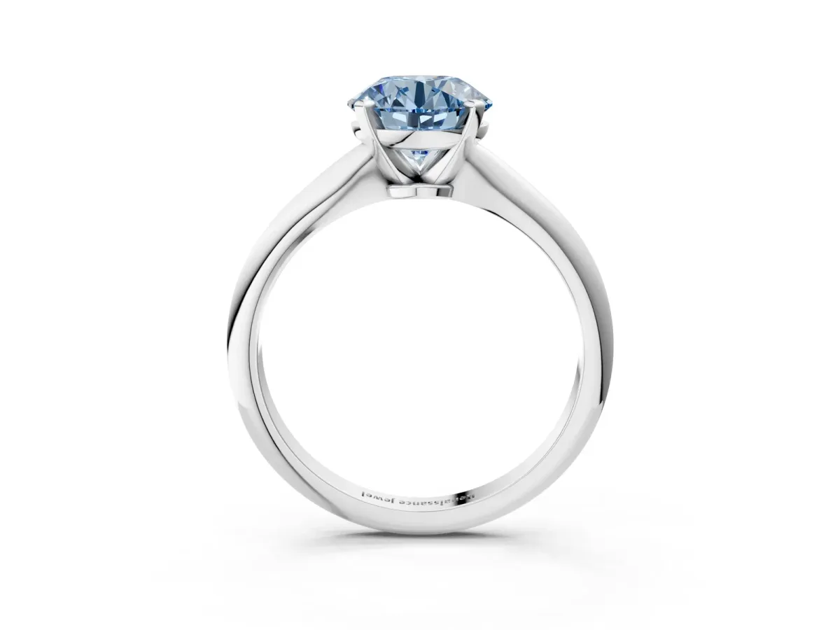 Fancy Blue Round Cut Diamond Solitaire Engagement Ring with Classic Band and Four-Prong Setting Silver