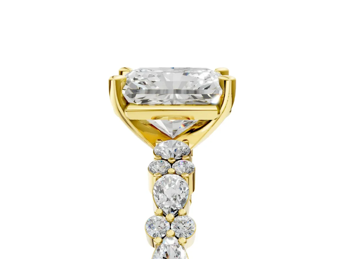 Radiant Cut Diamond Side Stone Solitaire Ring with Round and Four-Prong Setting Yellow gold