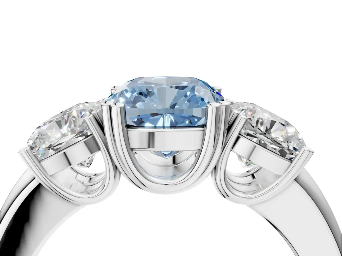 Fancy Blue Three-Stone Cushion Cut Cut Diamond Ring with Channel Set Band and Four-Prong Setting Silver