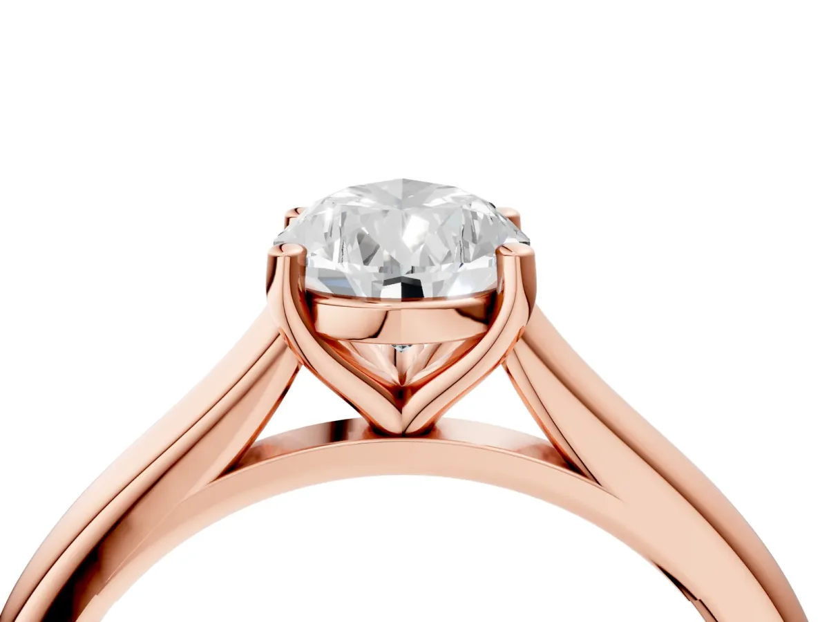 Pear Cut Cut Solitaire Ring with Cathedral Band and Four-Prong Setting Rose gold