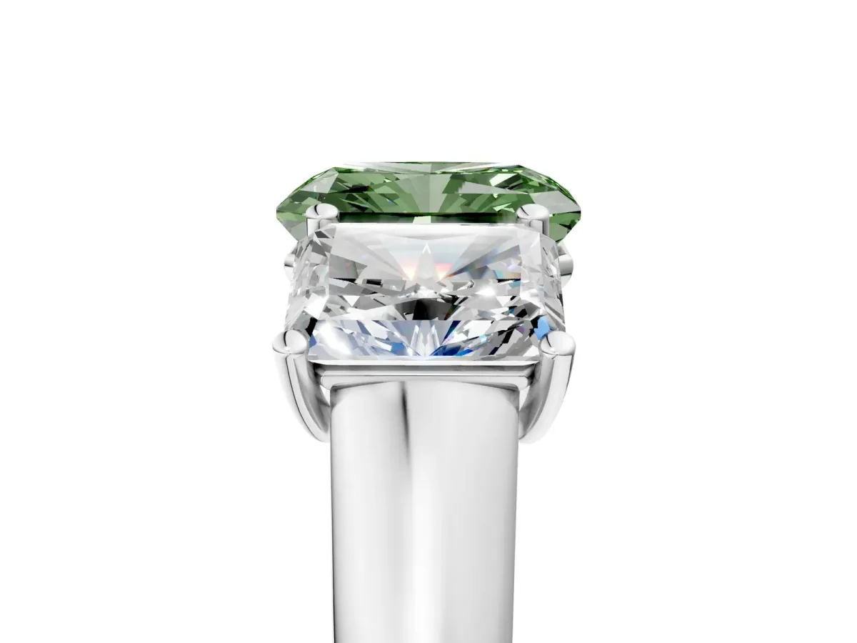 Fancy Green Radiant Cut Three-Stone Diamond Ring with Prong Setting on a Classic Band Platinum
