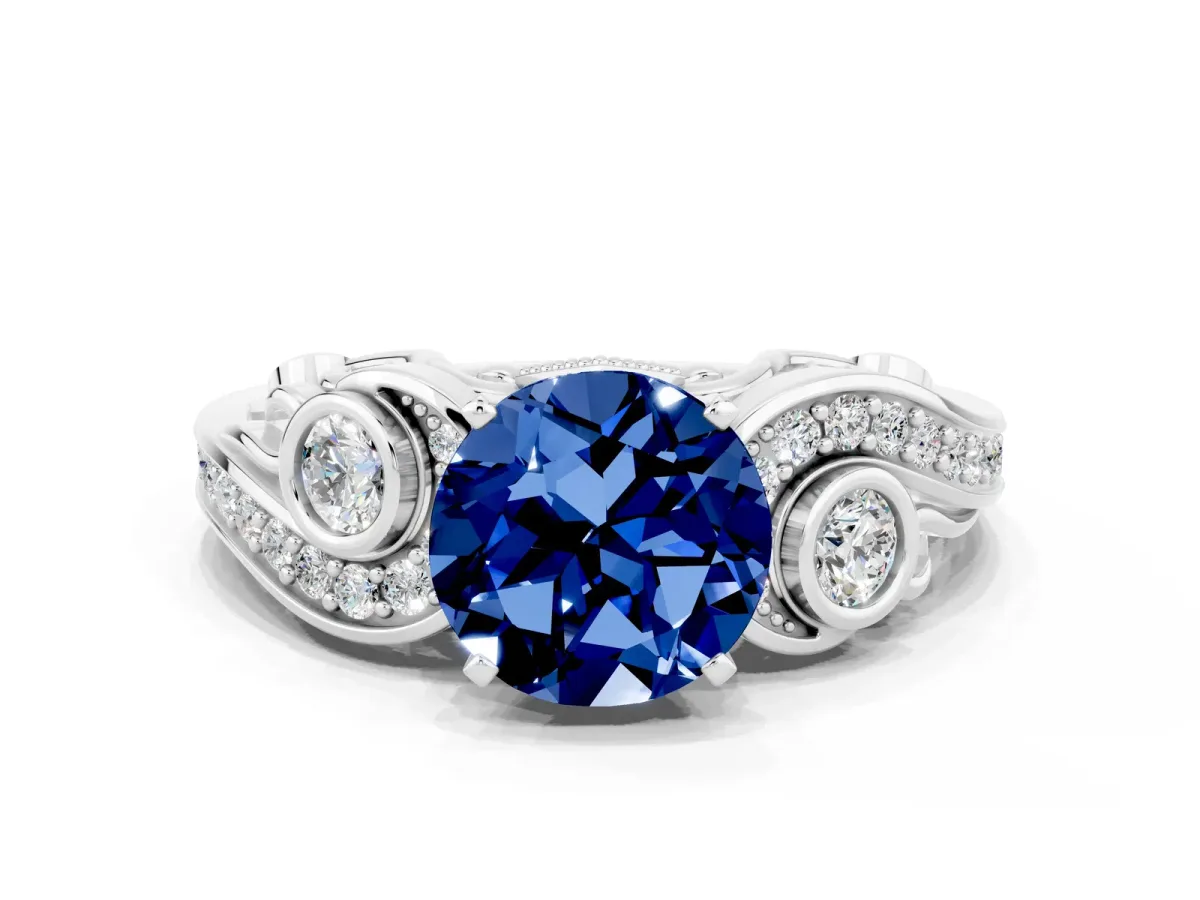 Round Cut Blue Sapphire Solitaire Ring with Milgrain Pavé Band and Four-Prong Setting Silver