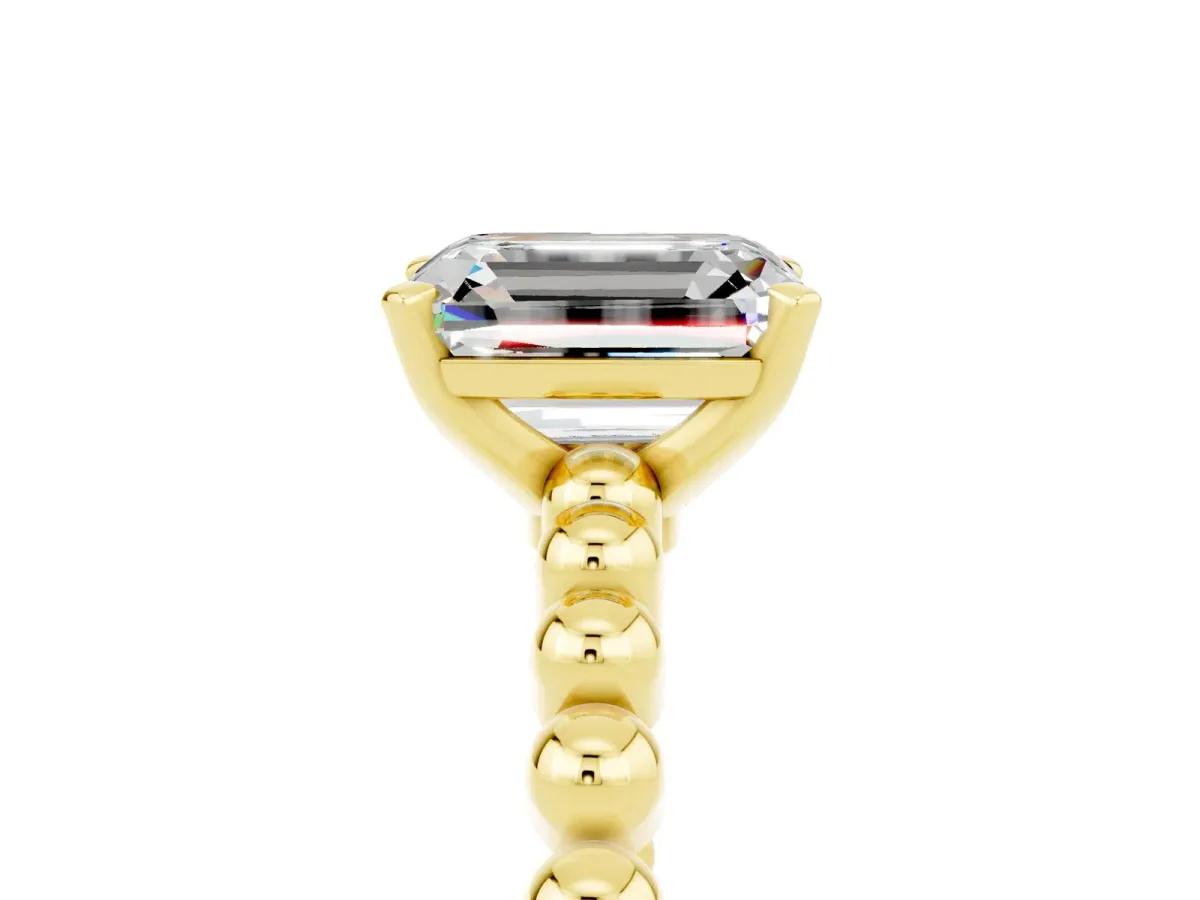 Emerald Cut Moissanite Solitaire Ring with Beaded Band and Prong Setting Yellow gold