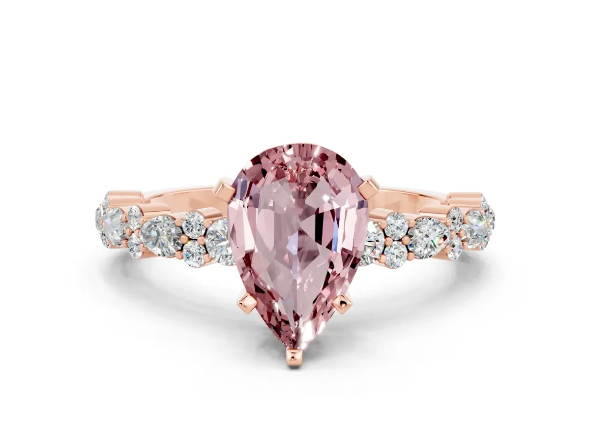 Pear Cut Morganite Side Stone Solitaire Ring with Round and Four-Prong Setting Rose gold