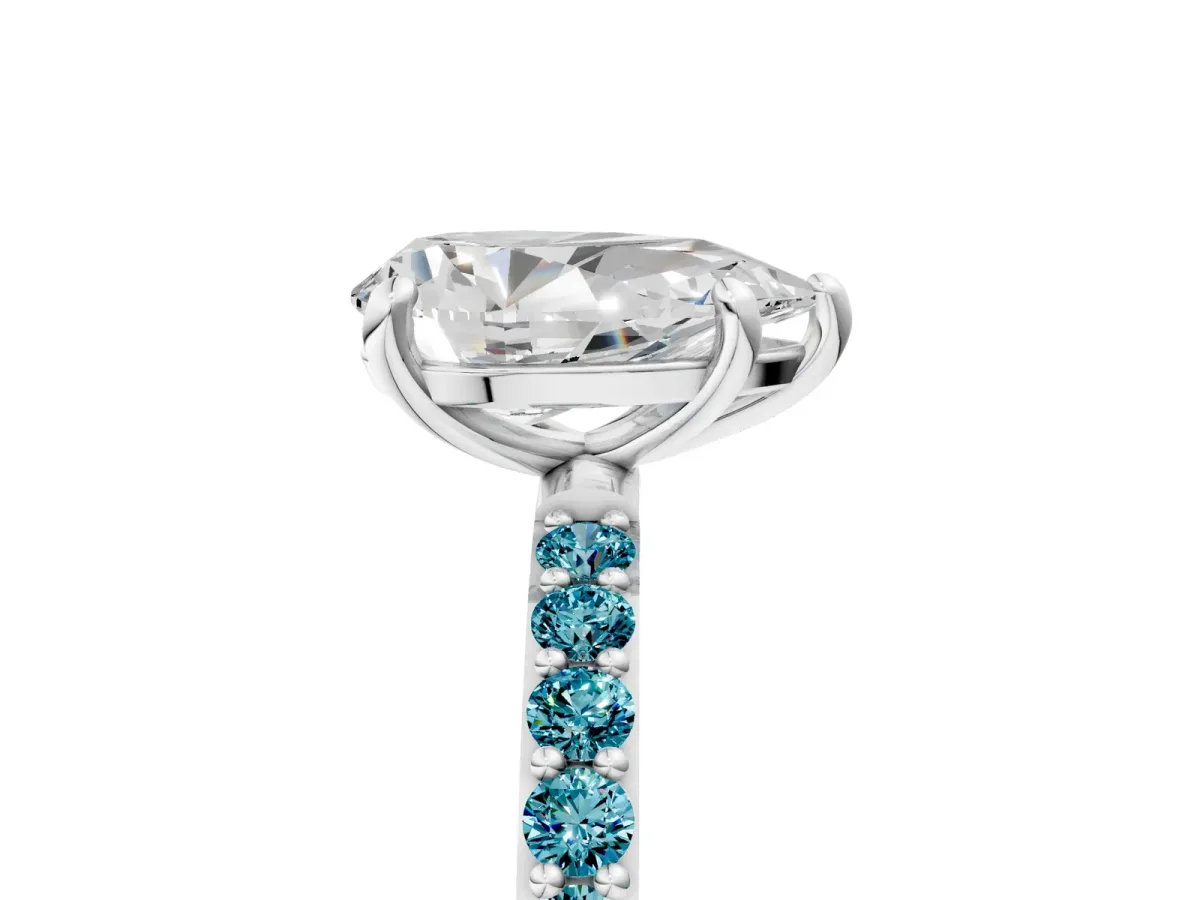 Pear Cut Diamond Solitaire Ring with Round Blue Topaz Pavé Band and Prong Setting Silver