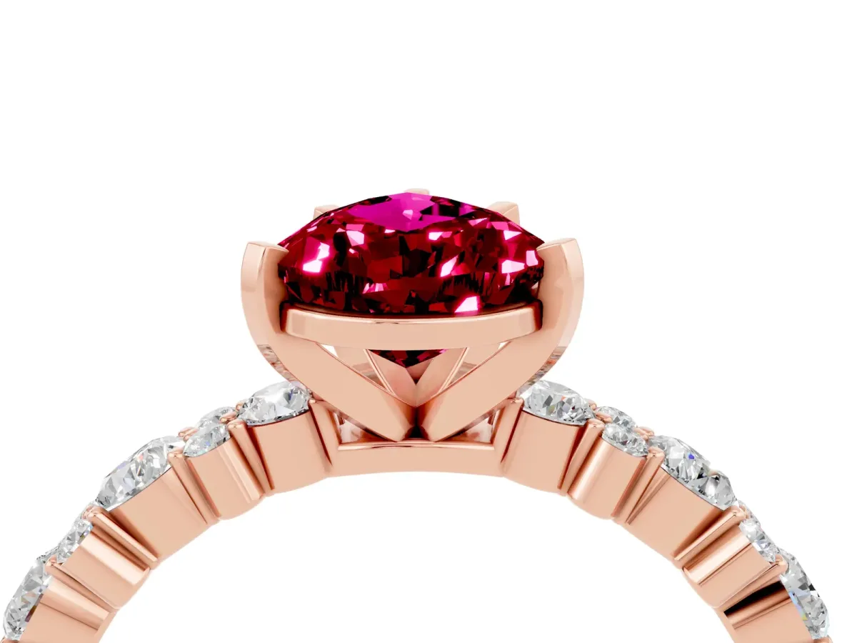 Pear Cut Garnet Side Stone Solitaire Ring with Round and Four-Prong Setting Rose gold
