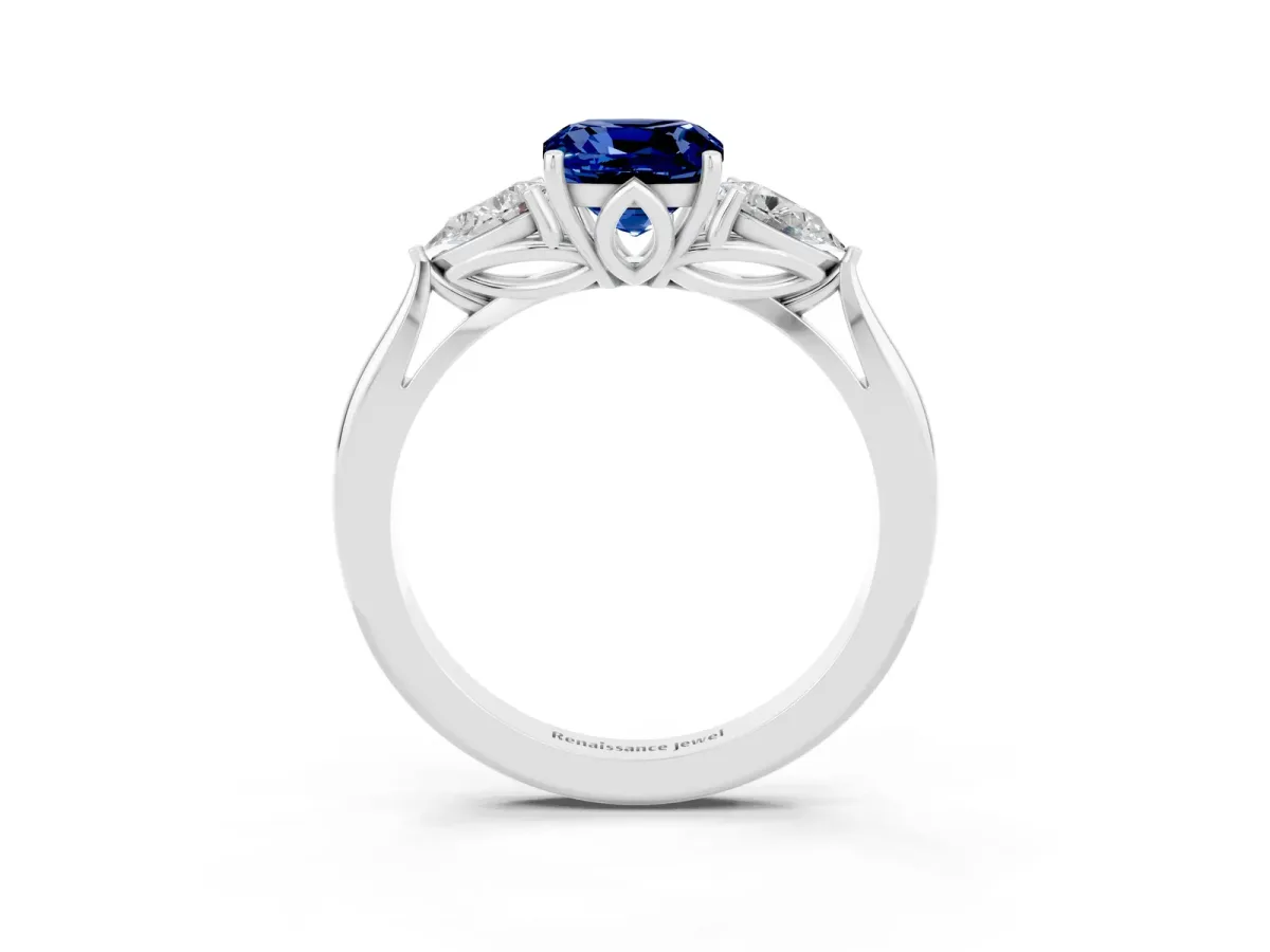 Three-Stone Cushion Cut Blue Sapphire Ring with Pear Side Stones in Four-Prong Setting White gold