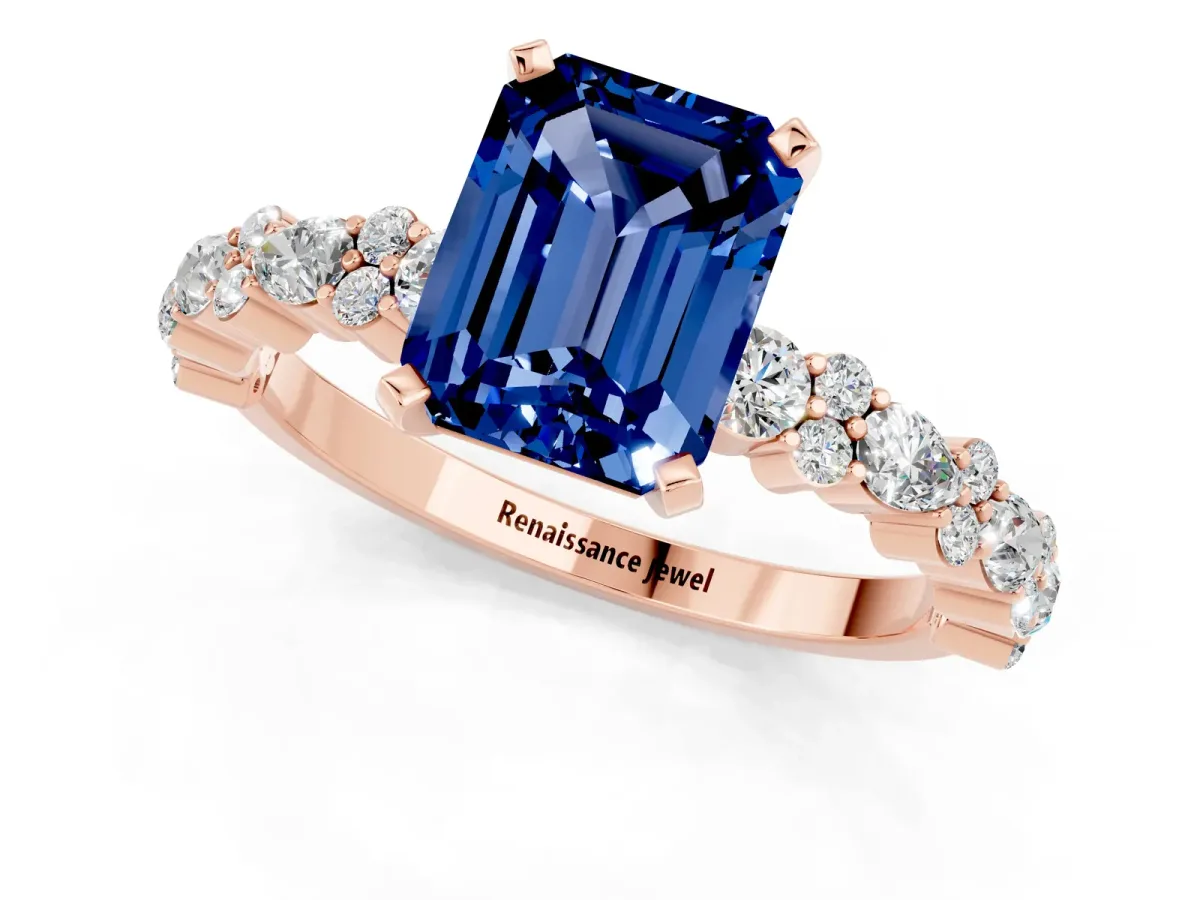 Emerald Cut Blue Sapphire Side Stone Solitaire Ring with Round and Four-Prong Setting Rose gold