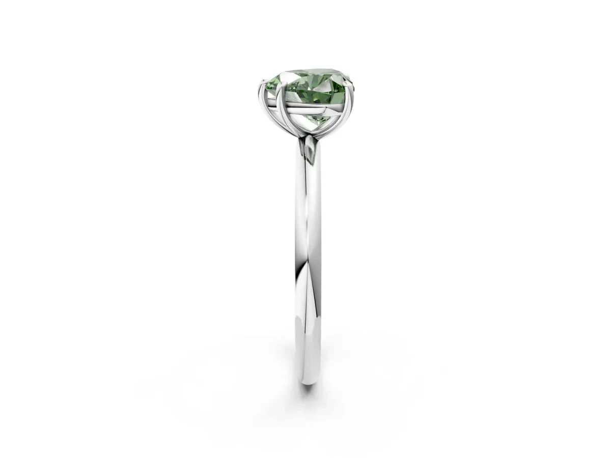 Fancy Green Heart Cut Solitaire Diamond Ring with Four-Prong Setting on a Plain Band Platinum