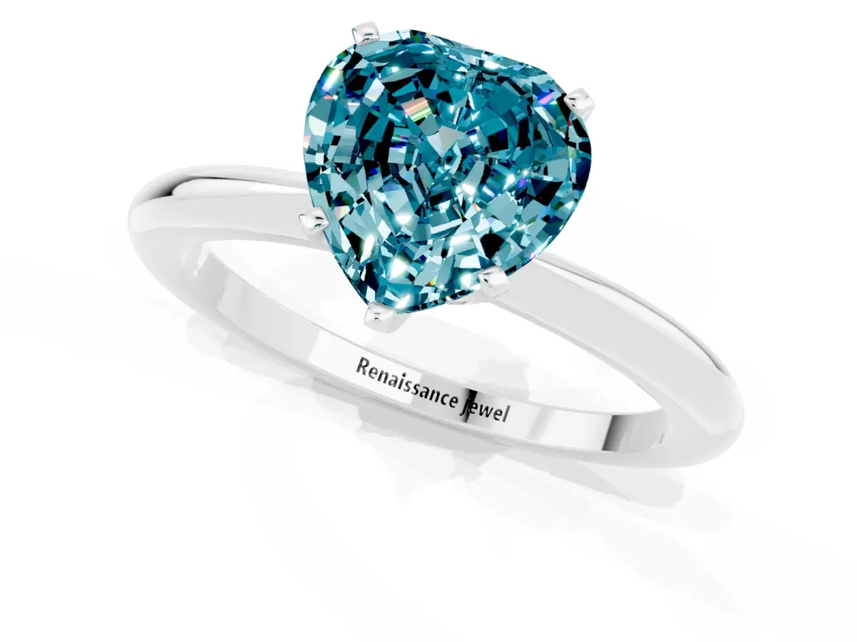 Heart Cut Blue Topaz Solitaire Ring with Six-Prong Setting and Classic Band Silver