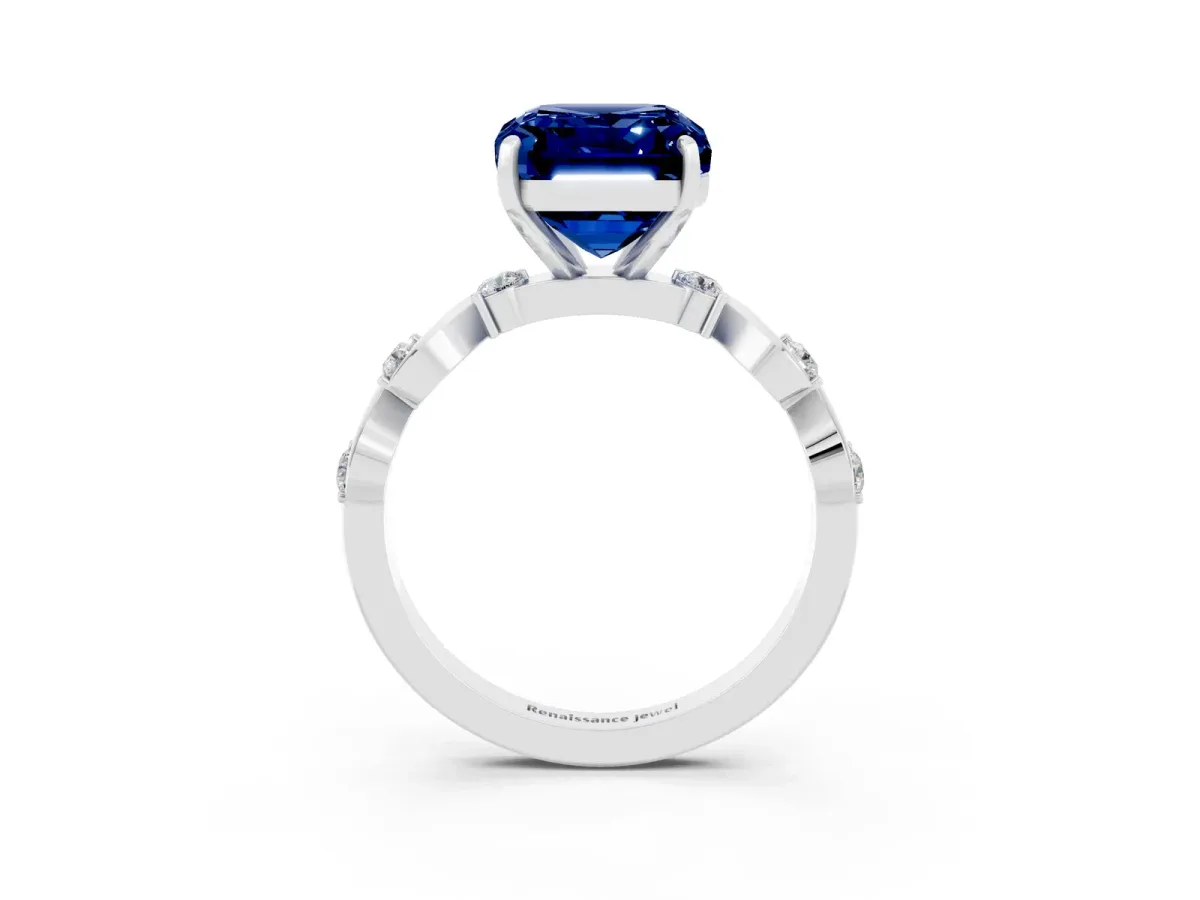 Emerald Cut Blue Sapphire Solitaire Twisted Band with Round Accents and Prong Setting Silver
