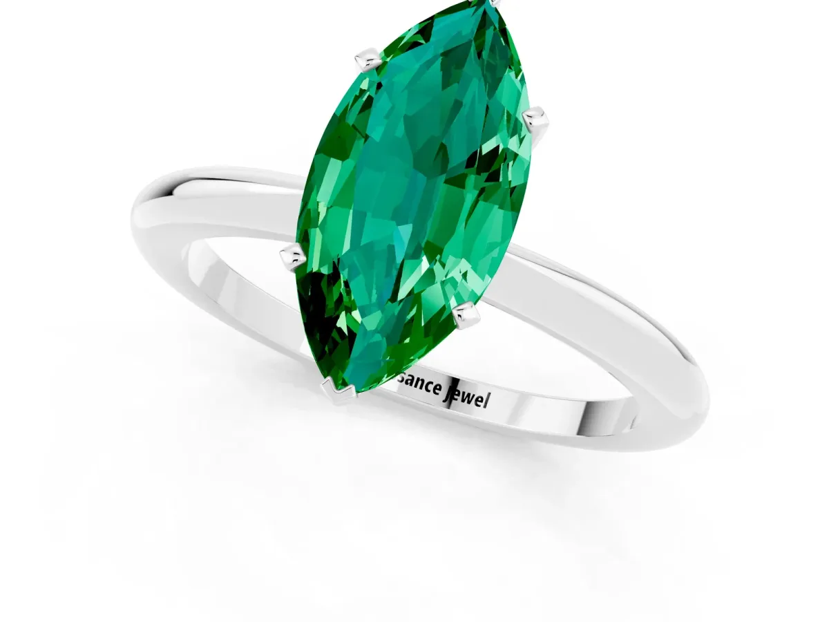 Marquise Cut Emerald Solitaire Ring with Six-Prong Setting and Classic Band Platinum