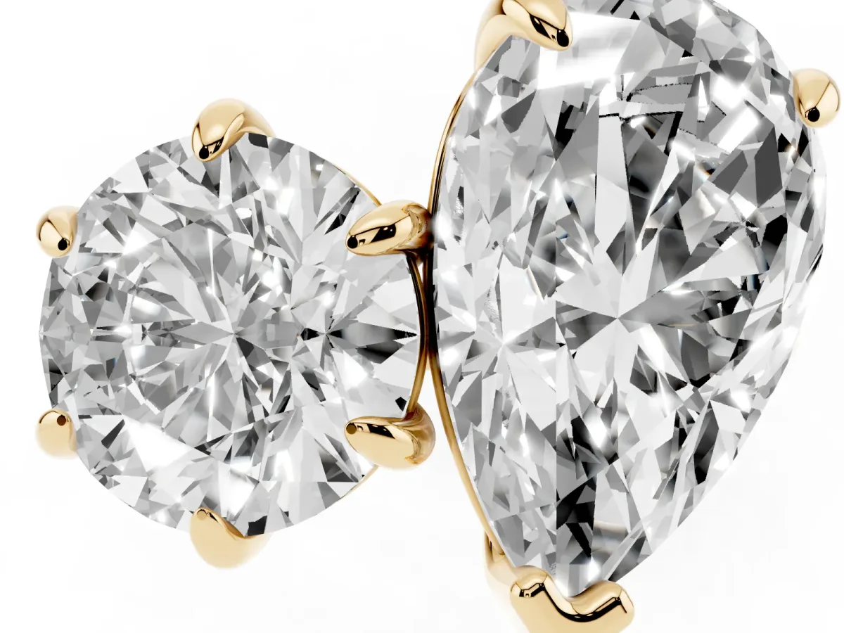 Round and Pear Toi Moi Ring with Prong Setting and Plain Band Yellow gold