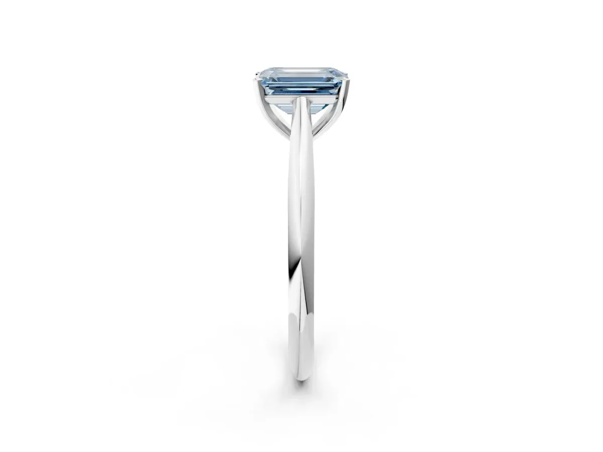 Fancy Blue Emerald Cut Diamond Solitaire Engagement Ring with Cathedral Setting and Four-Prong Mount White gold
