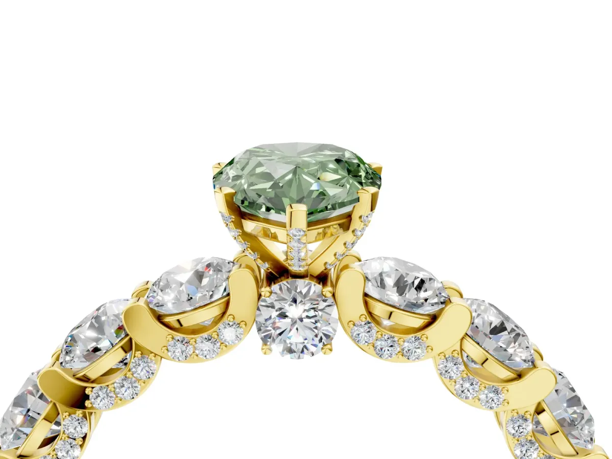 Fancy Green Pear Cut Diamond Side Stone Engagement Ring with Four-Prong Setting Yellow gold