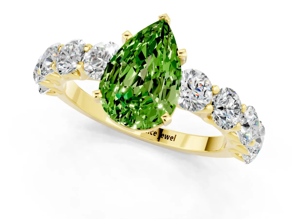 Pear Cut Peridot Prong Setting with Side Stones on a Pave Band Yellow gold