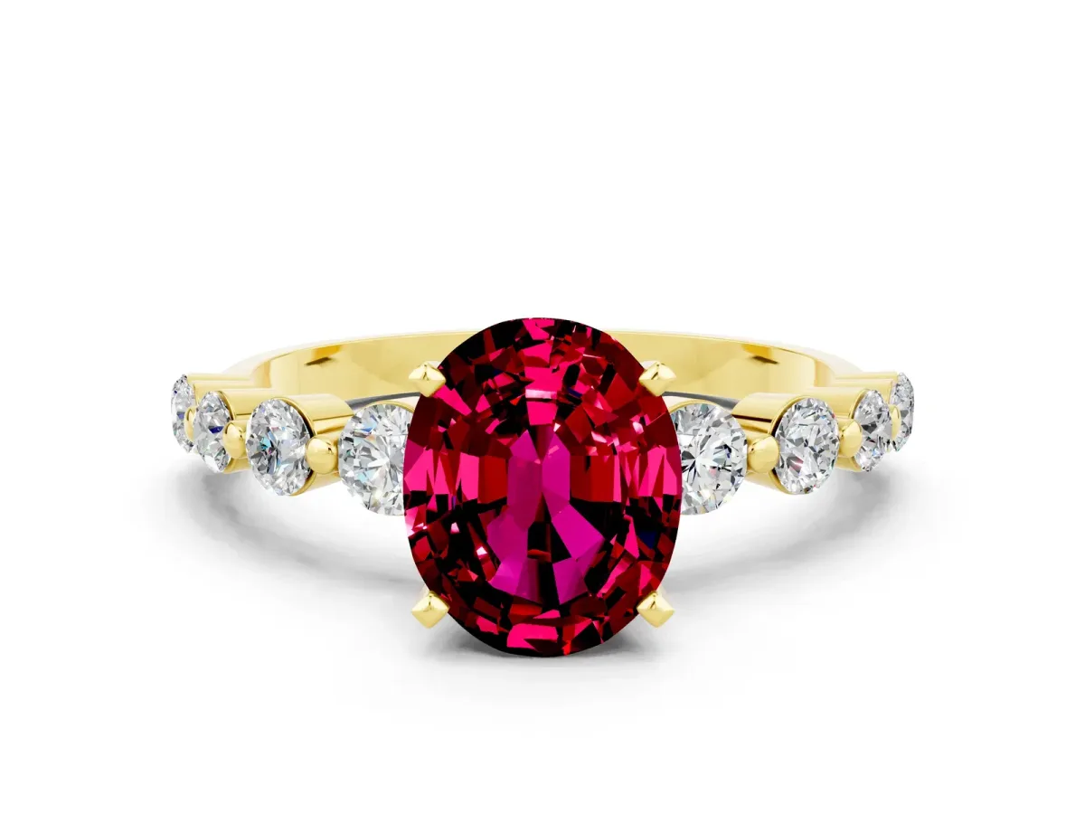 Oval Cut Solitaire Garnet Ring with Pave Band and Four-Prong Setting Yellow gold