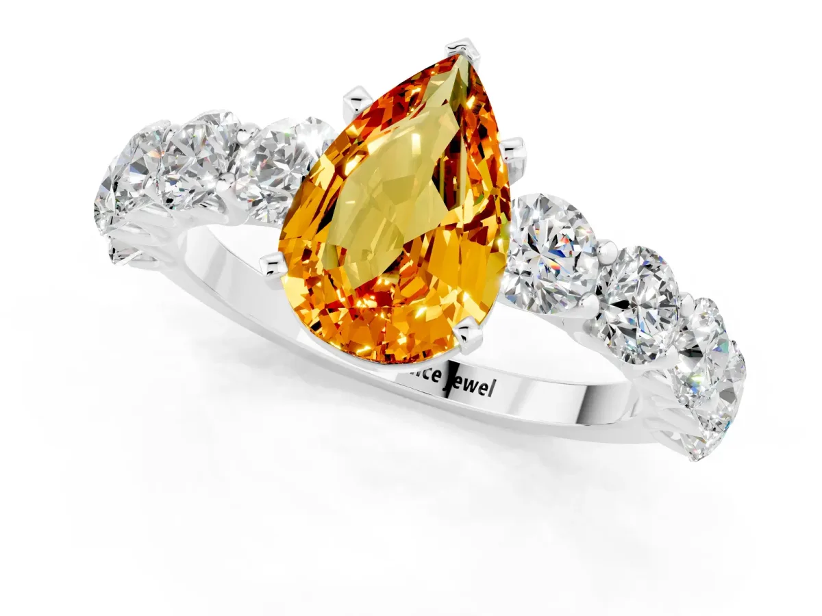 Pear Cut Citrine Prong Setting with Side Stones on a Pave Band Silver