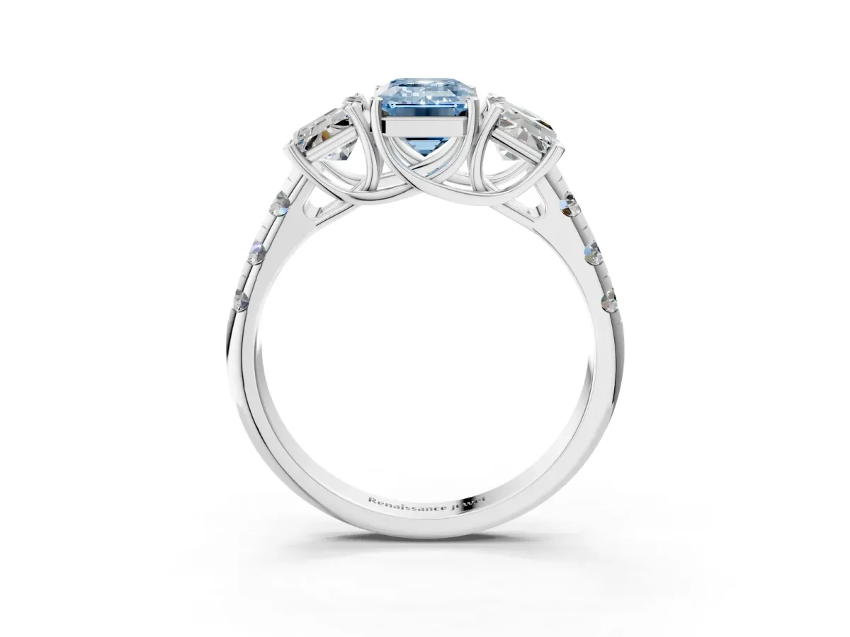 Fancy Blue Three-Stone Emerald Cut Diamond Pavé Band with Prong Setting Platinum