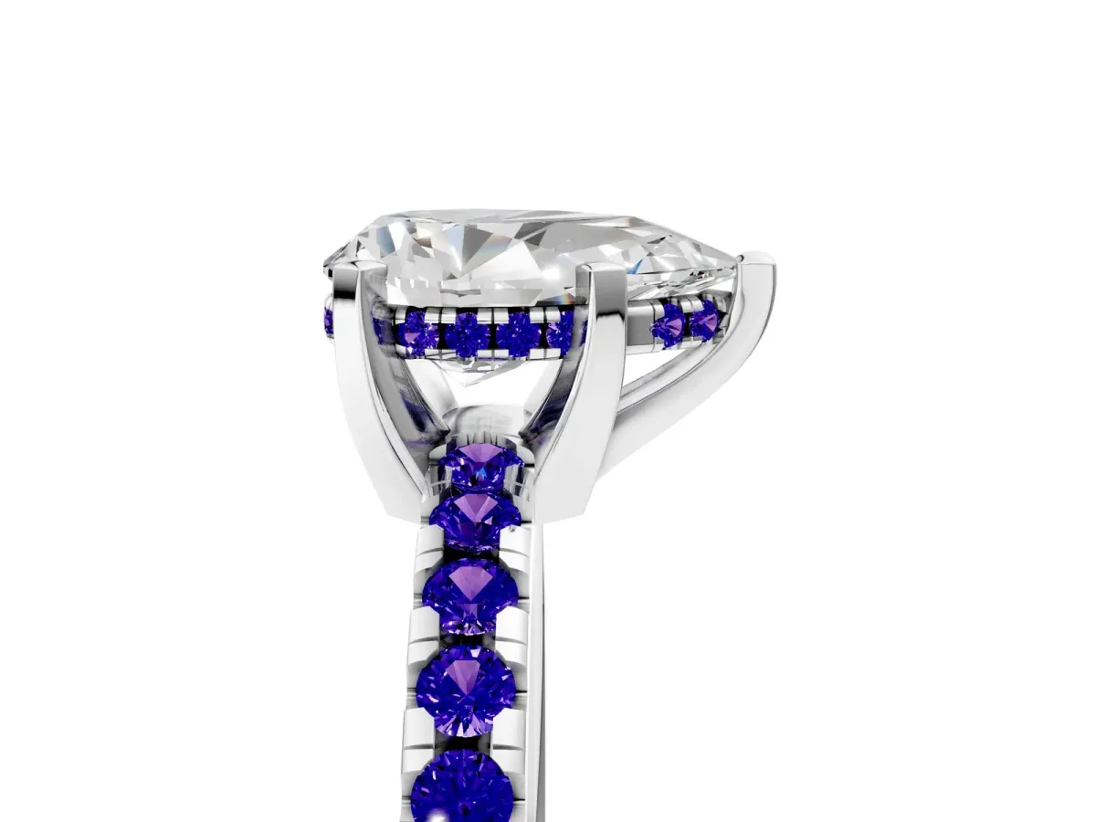 Pear Cut Diamond Solitaire Ring with Round Tanzanite Pavé Band and Four-Prong Setting Silver