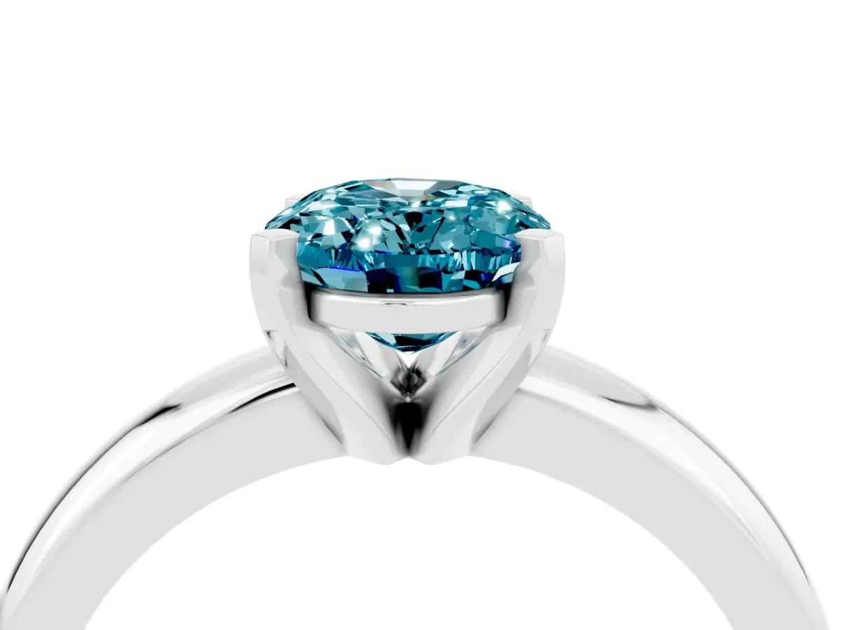 Oval Cut Blue Topaz Solitaire Engagement Ring with Round Band and Four-Prong Setting Silver