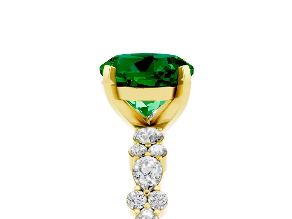 Round Cut Emerald Side Stone Solitaire Ring with Round and Four-Prong Setting Yellow gold