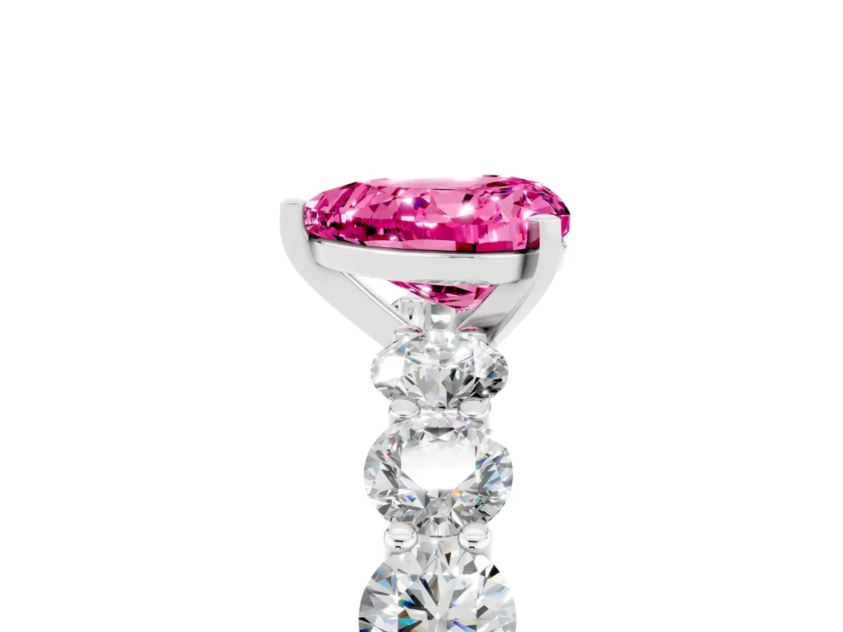 Heart Cut Pink Sapphire Prong Setting with Side Stones on a Pave Band Silver