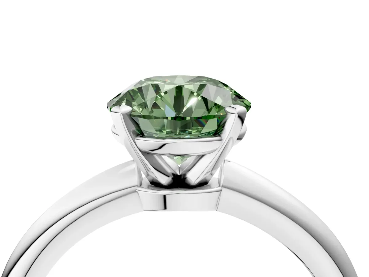 Fancy Green Round Cut Diamond Solitaire Ring with Six-Prong Setting and Classic Band Silver