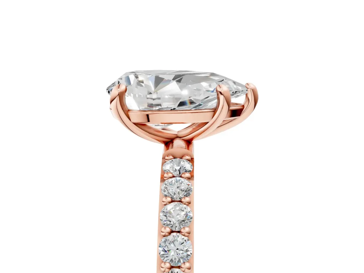 Pear Cut Diamond Solitaire Ring with Round Pavé Band and Prong Setting Rose gold