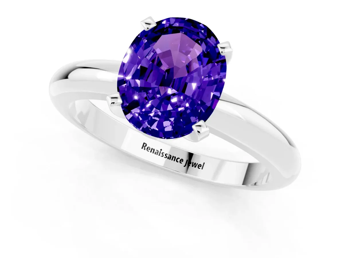 Oval Cut Tanzanite Solitaire Engagement Ring with Round Band and Four-Prong Setting Silver