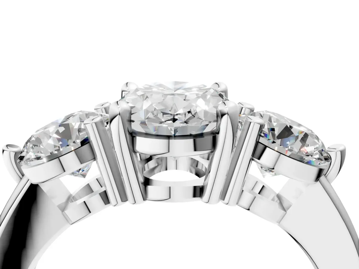 Three-Stone Oval Cut Brilliant Cut Solitaire Ring with Prong Setting on a Classic Band White gold