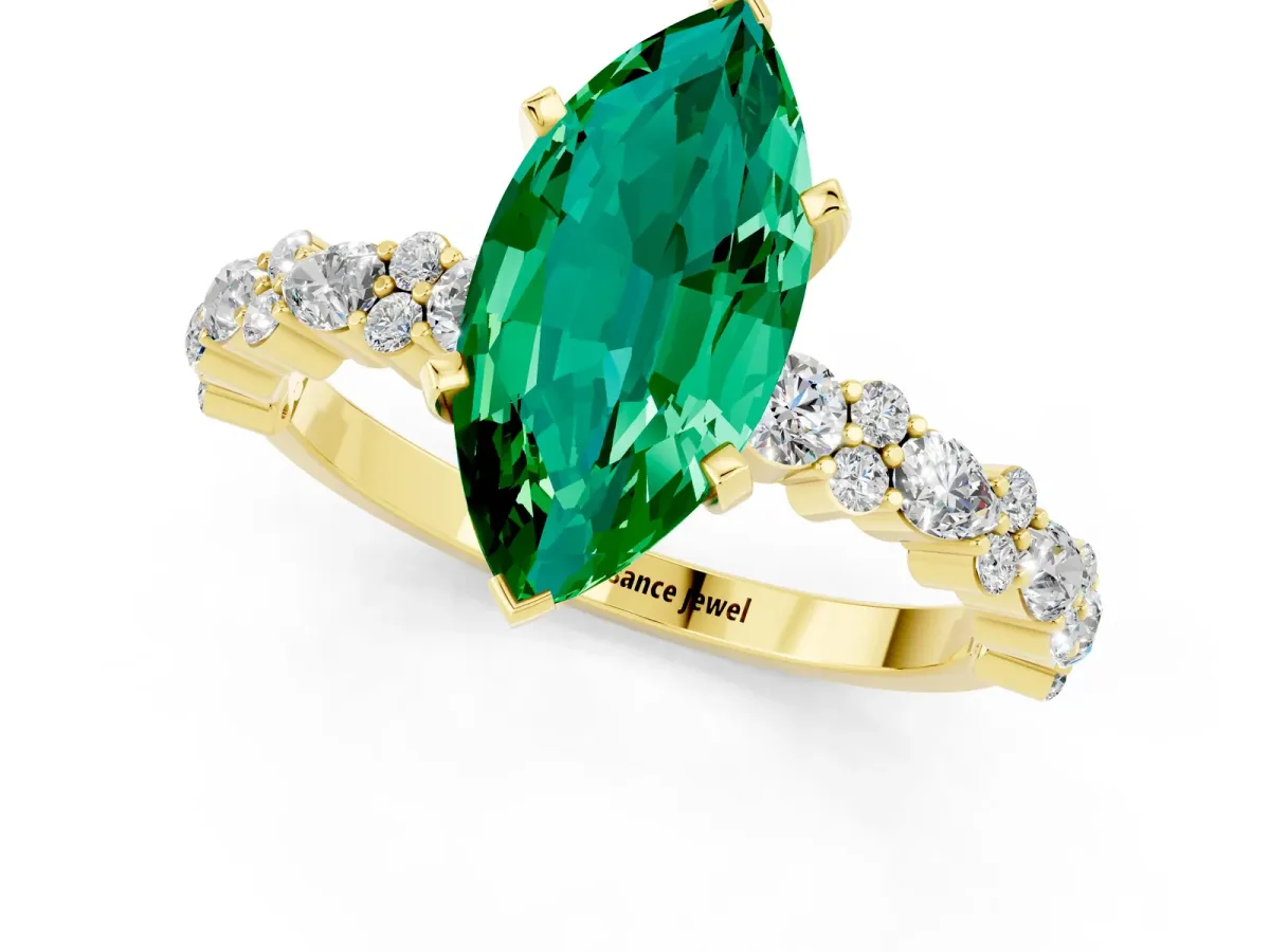 Marquise Cut Emerald Side Stone Solitaire Ring with Round and Four-Prong Setting Yellow gold