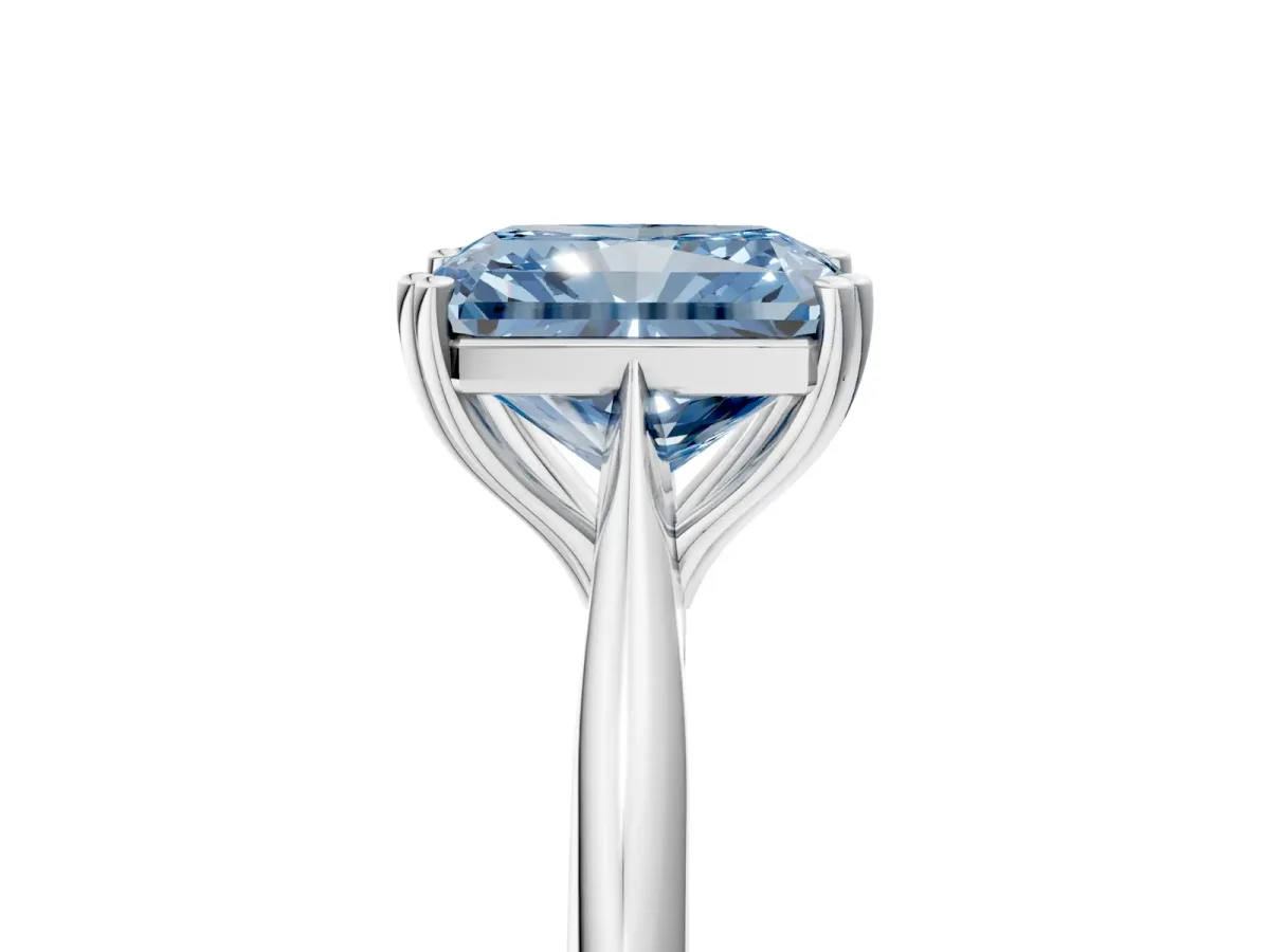 Fancy Blue Radiant Cut Solitaire Diamond Ring with Six-Prong Setting and Classic Band Platinum