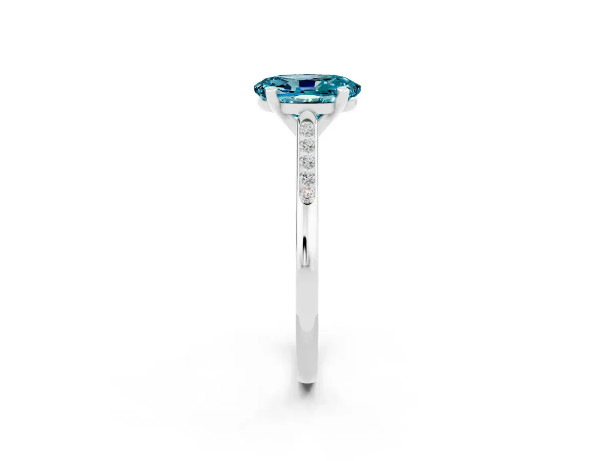 Oval Cut Blue Topaz Solitaire Ring with Channel Set Round Band and Prong Setting Silver