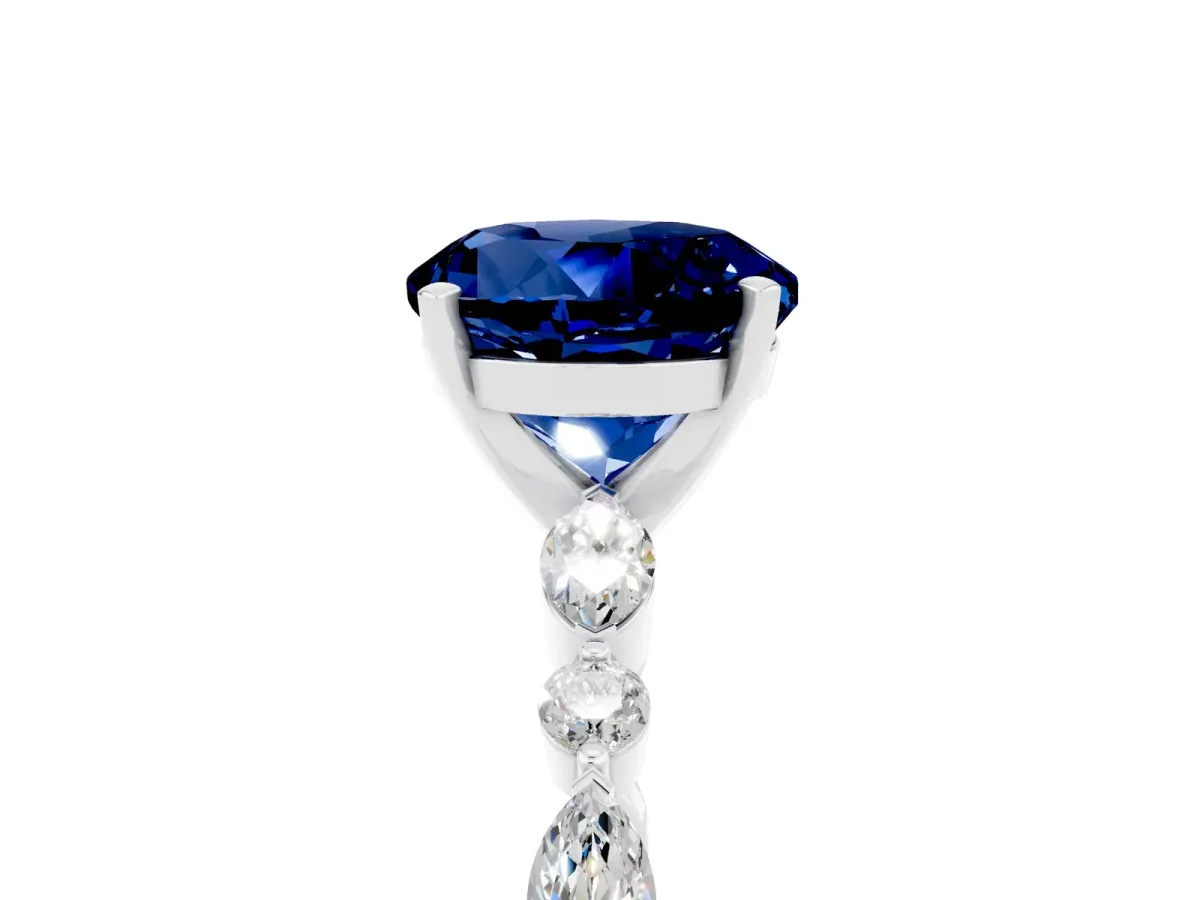 Round Cut Blue Sapphire Ring with Marquise and Round Side Stones and Four-Prong Setting Silver