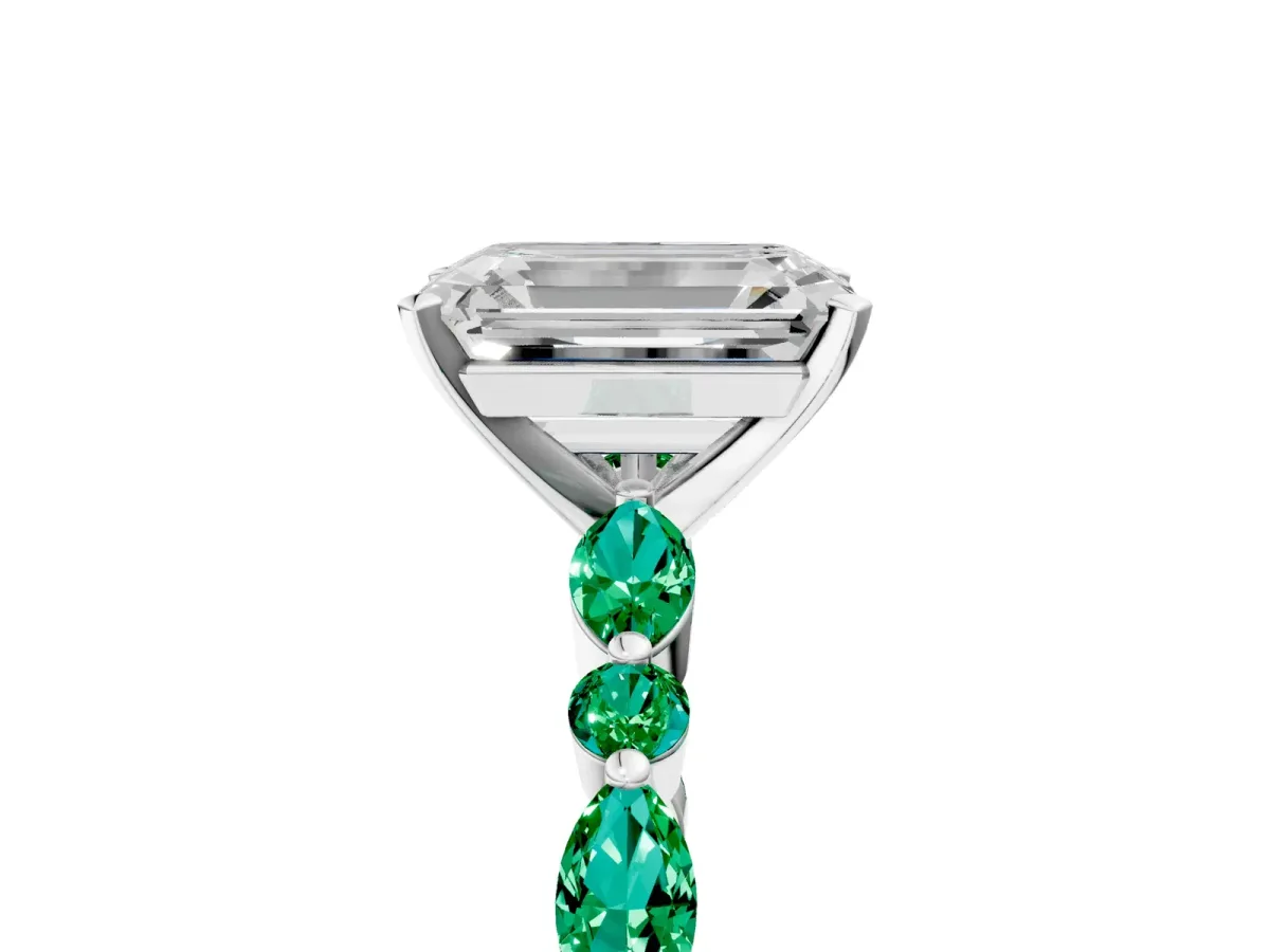 Emerald Cut Diamond Ring with Marquise and Round Emerald Side Stones and Four-Prong Setting Silver