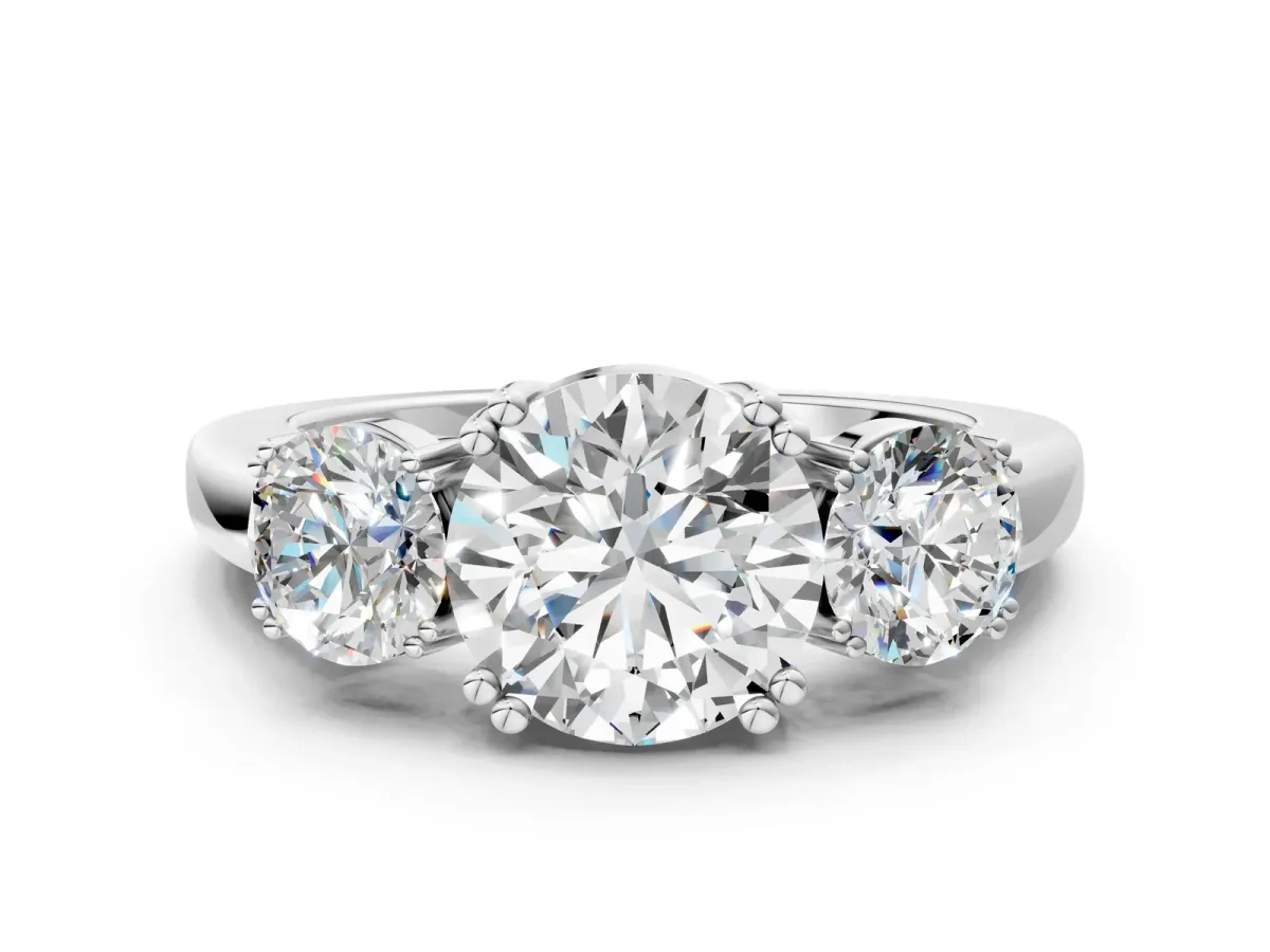 Three-Stone Round Cut Cut Diamond Ring with Channel Set Band and Four-Prong Setting White gold