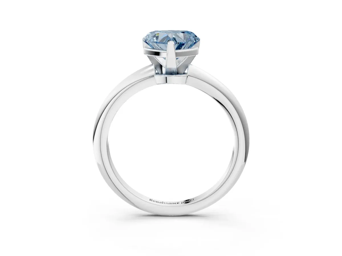 Fancy Blue Heart Cut Diamond Solitaire Ring with Six-Prong Setting and Classic Band Silver