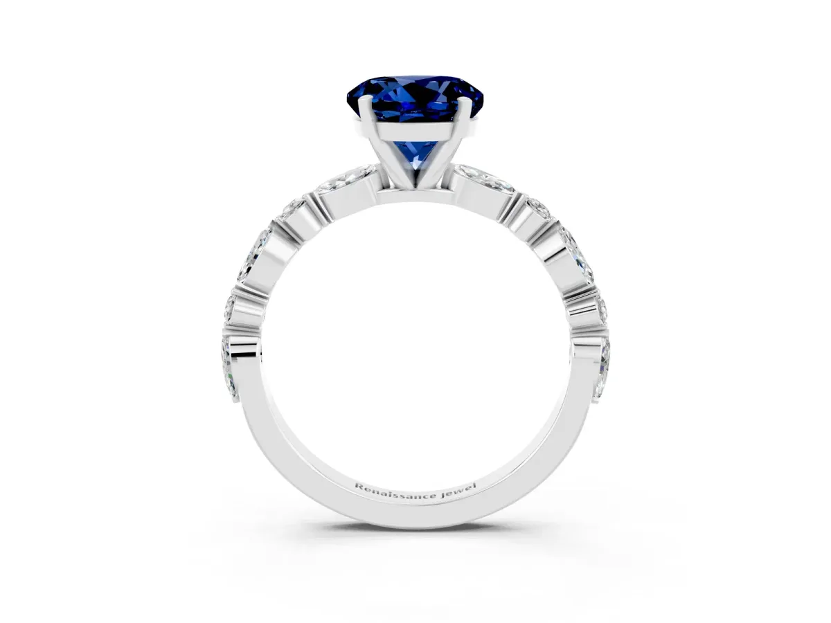 Round Cut Blue Sapphire Ring with Marquise and Round Side Stones and Four-Prong Setting Silver