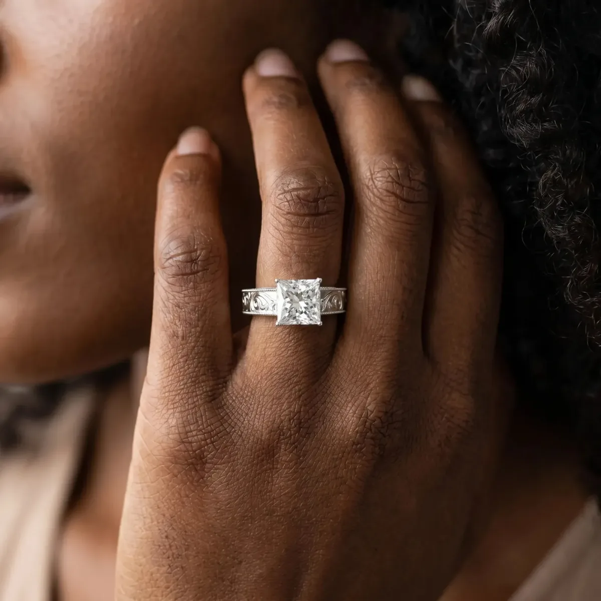 Princess Cut Diamond Solitaire Ring with Engraved Band and Four-Prong Setting White gold
