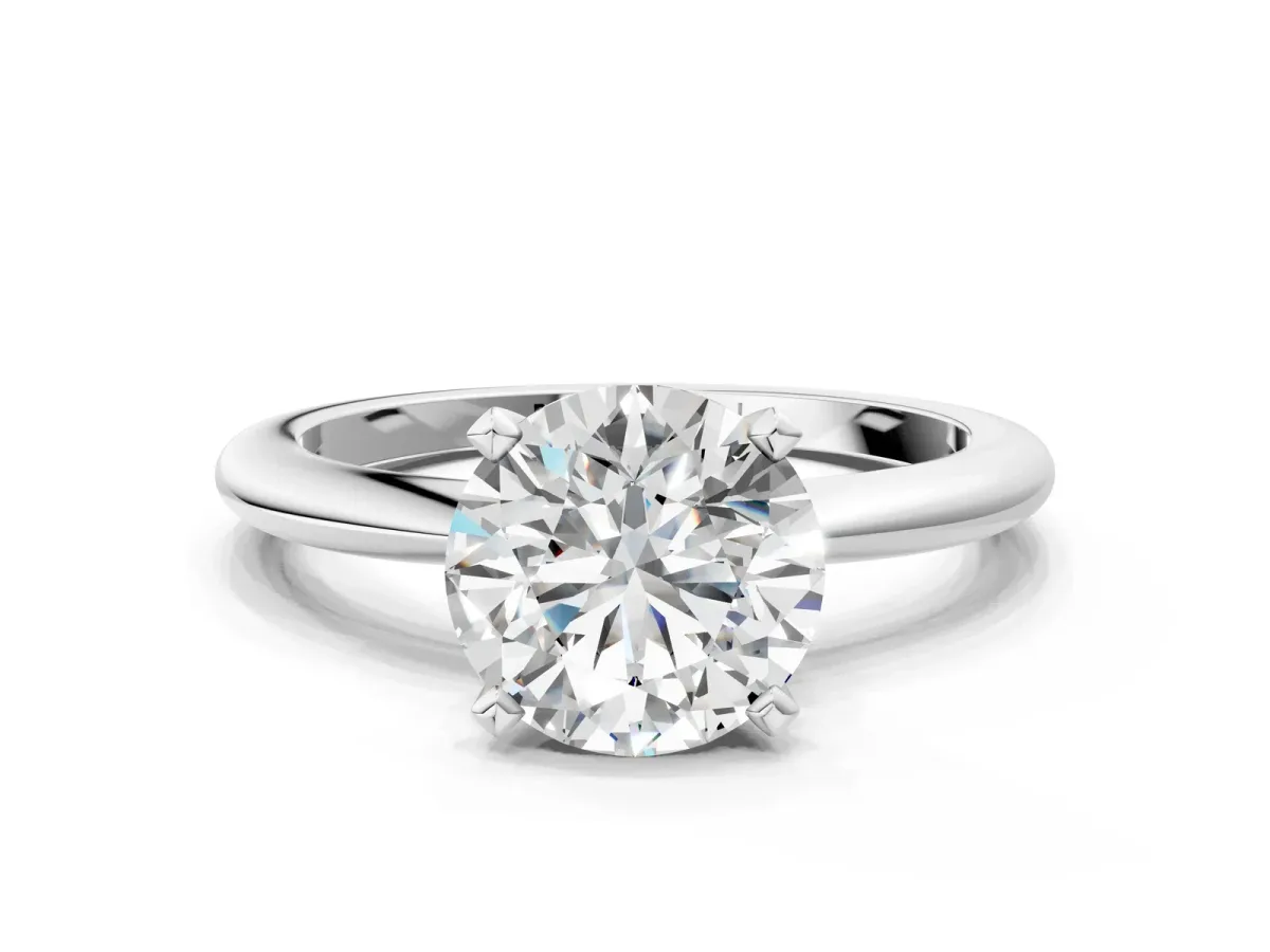 Round Cut Diamond Solitaire Ring with Six-Prong Setting and Classic Band Platinum