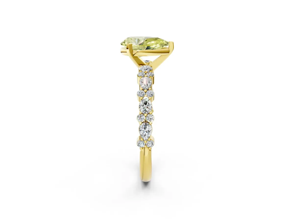 Fancy Yellow Pear Cut Diamond Side Stone Solitaire Ring with Round and Four-Prong Setting Yellow gold